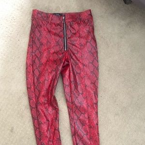 Red snakeskin leather pants